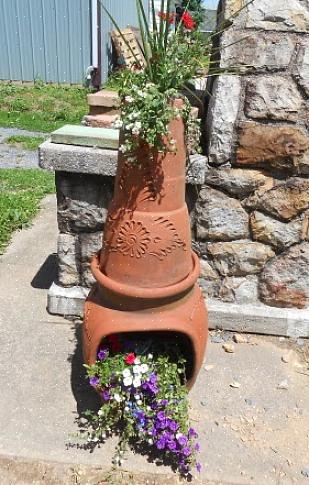 העיצוב של chimenea מאפשר להשתמש בו בגשם מבלי שהמים יכבו את להבתו